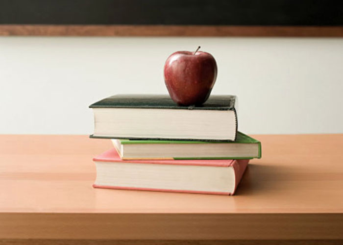 misc apple on desk TR Trades